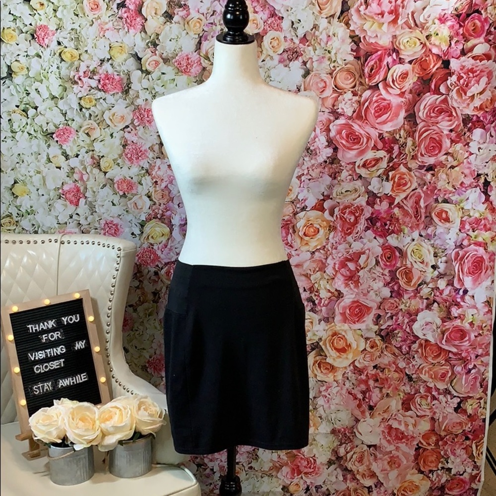 Black mini skirt from Magazine Size Large.